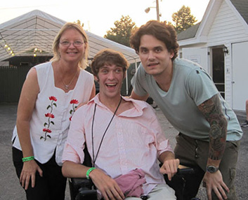 Zach, his mother Susan and musician John Mayer