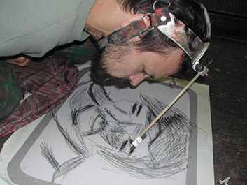 Dan Keplinger creates charcoal drawing